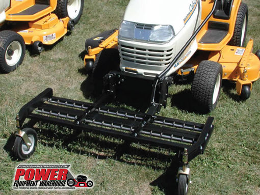 Image of Dethatching lawn tractor rake